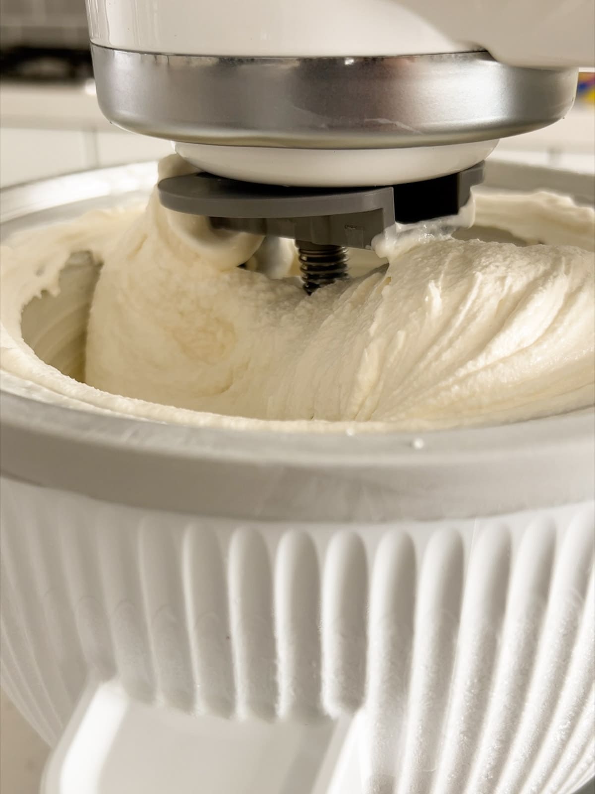 Vanilla ice cream thickens as it churns.