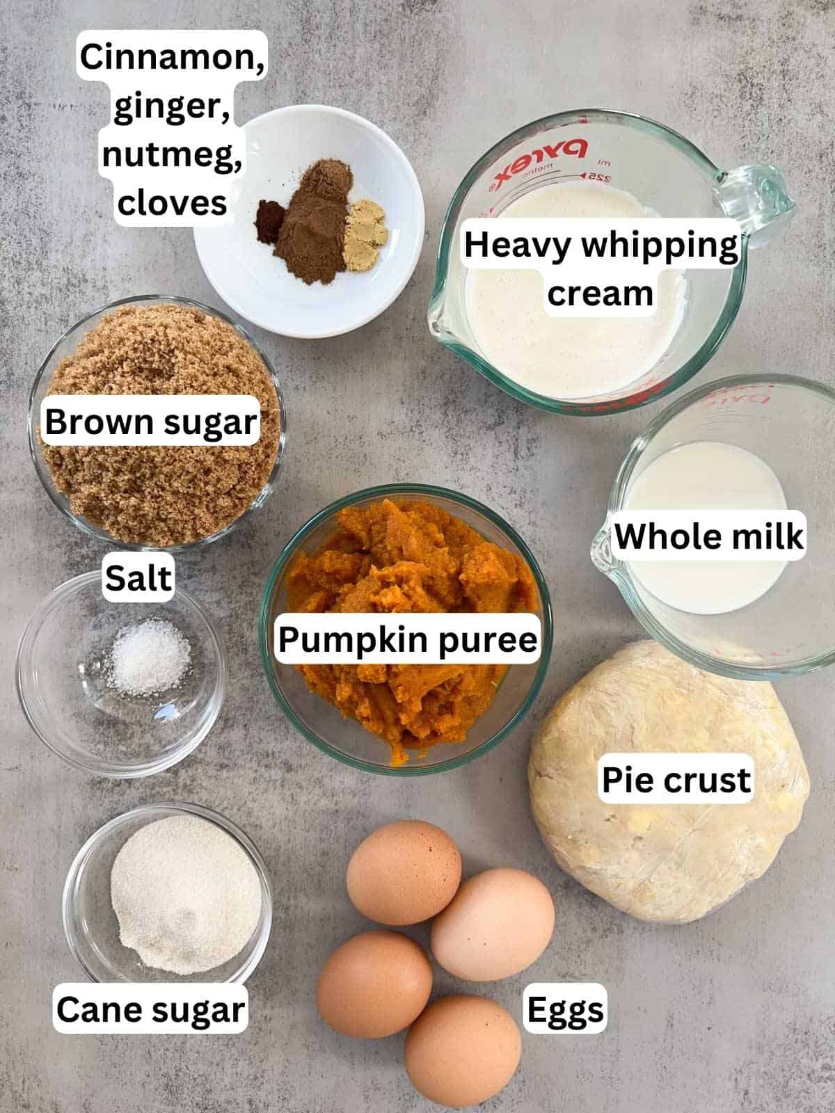 The ingredients to make pumpkin custard pie.