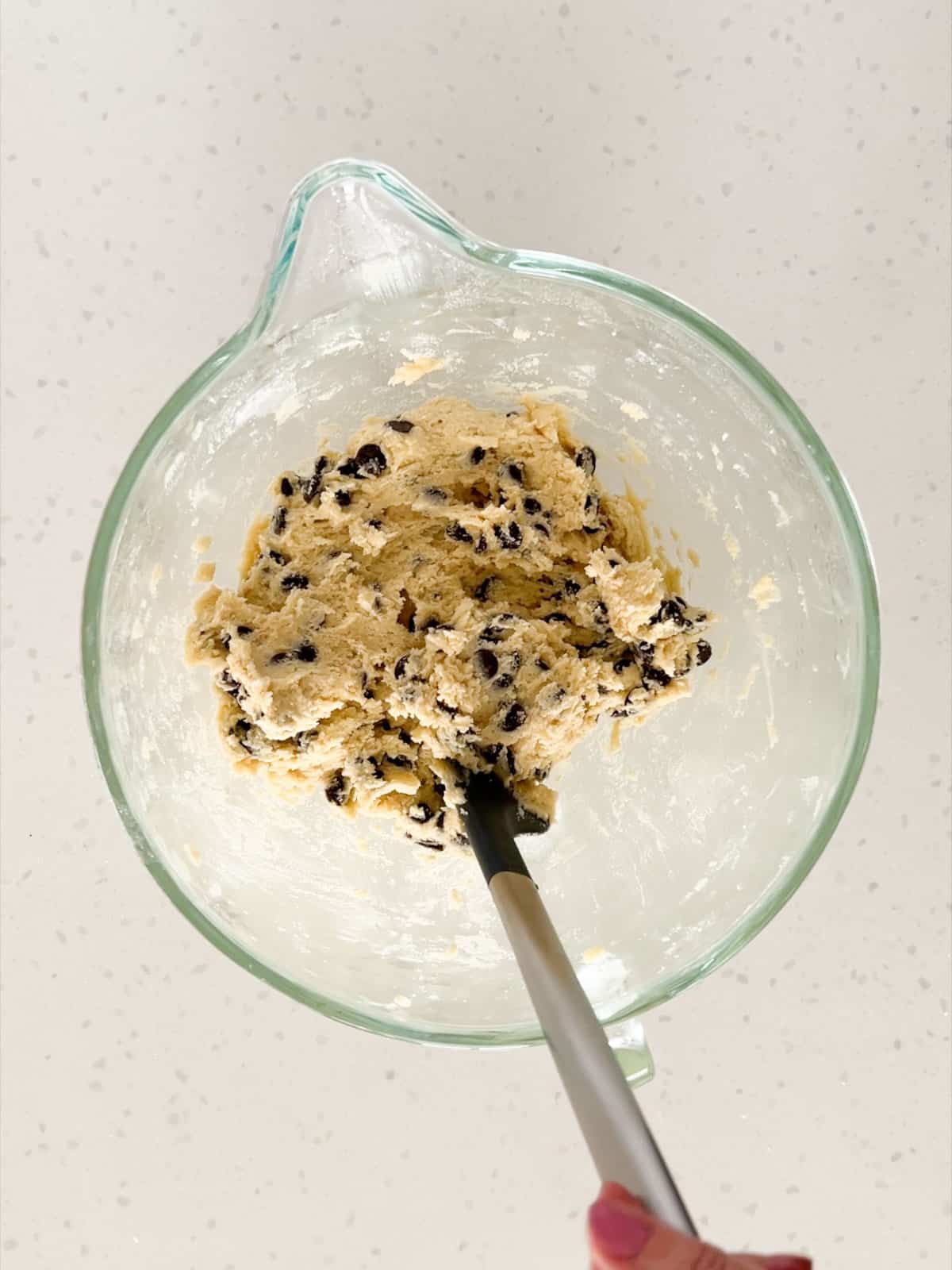 The wet and dry ingredients are mixed together and the chocolate chips are folded in.