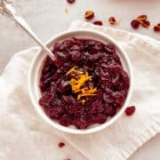 A bowl of cranberry sauce made from dried cranberries.