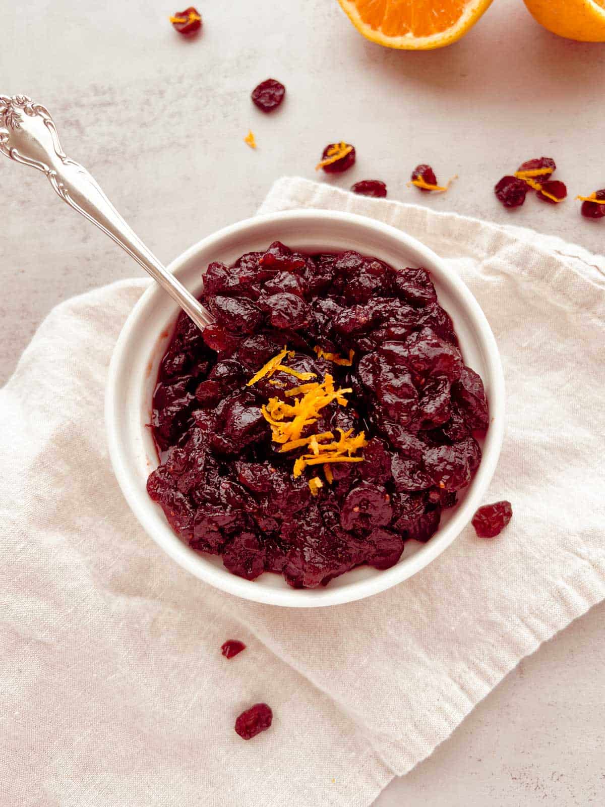 A bowl of cranberry sauce made from dried cranberries.