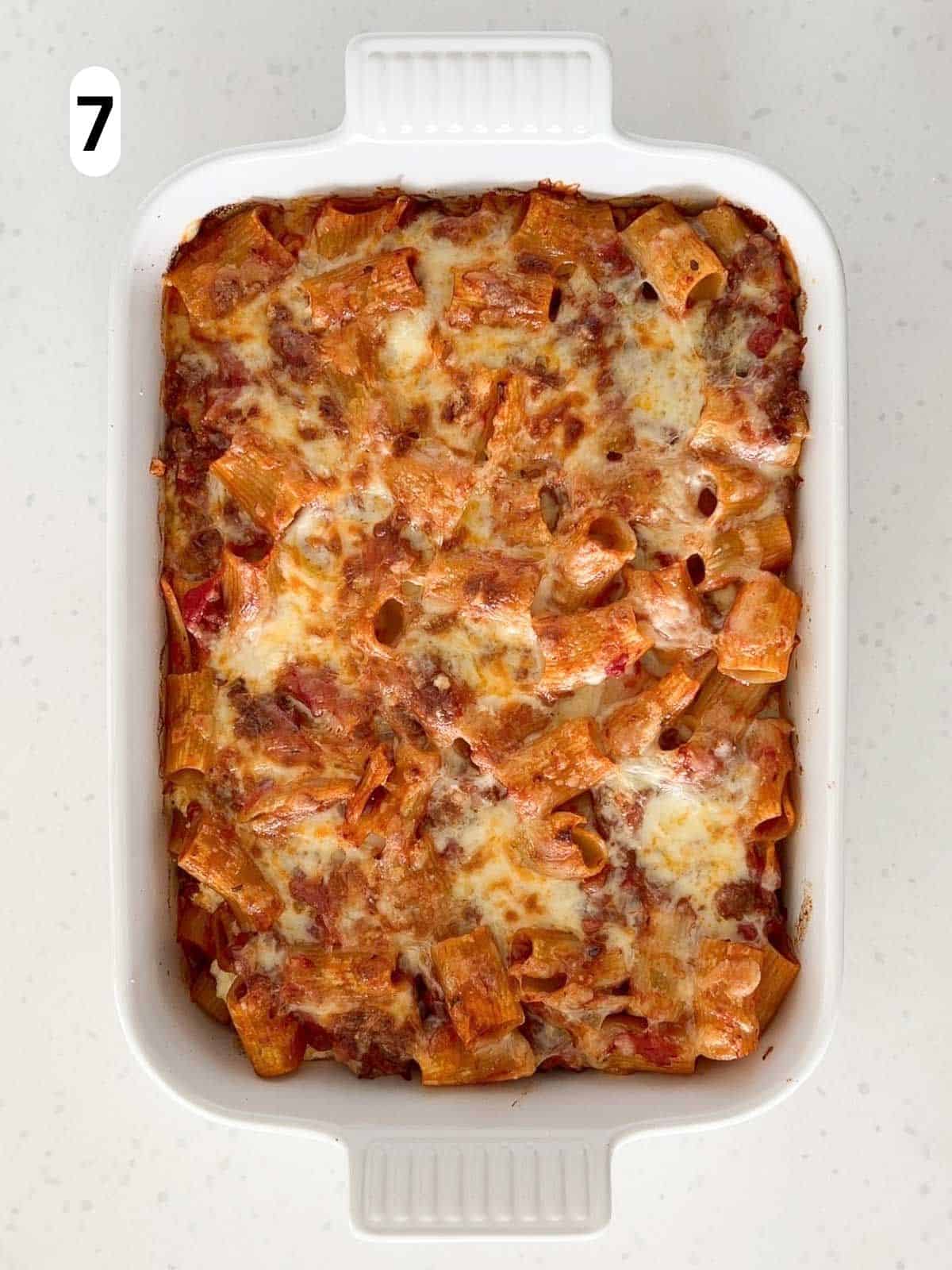 The rigatoni is baked until the cheese is melted and golden.