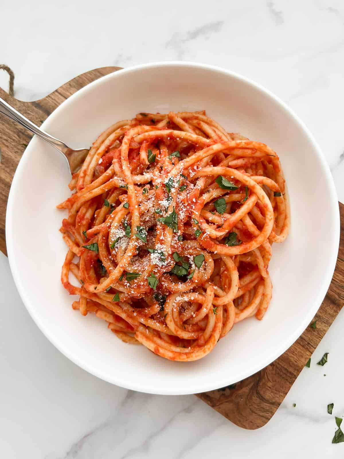 A bowl of bucatini pomodoro.