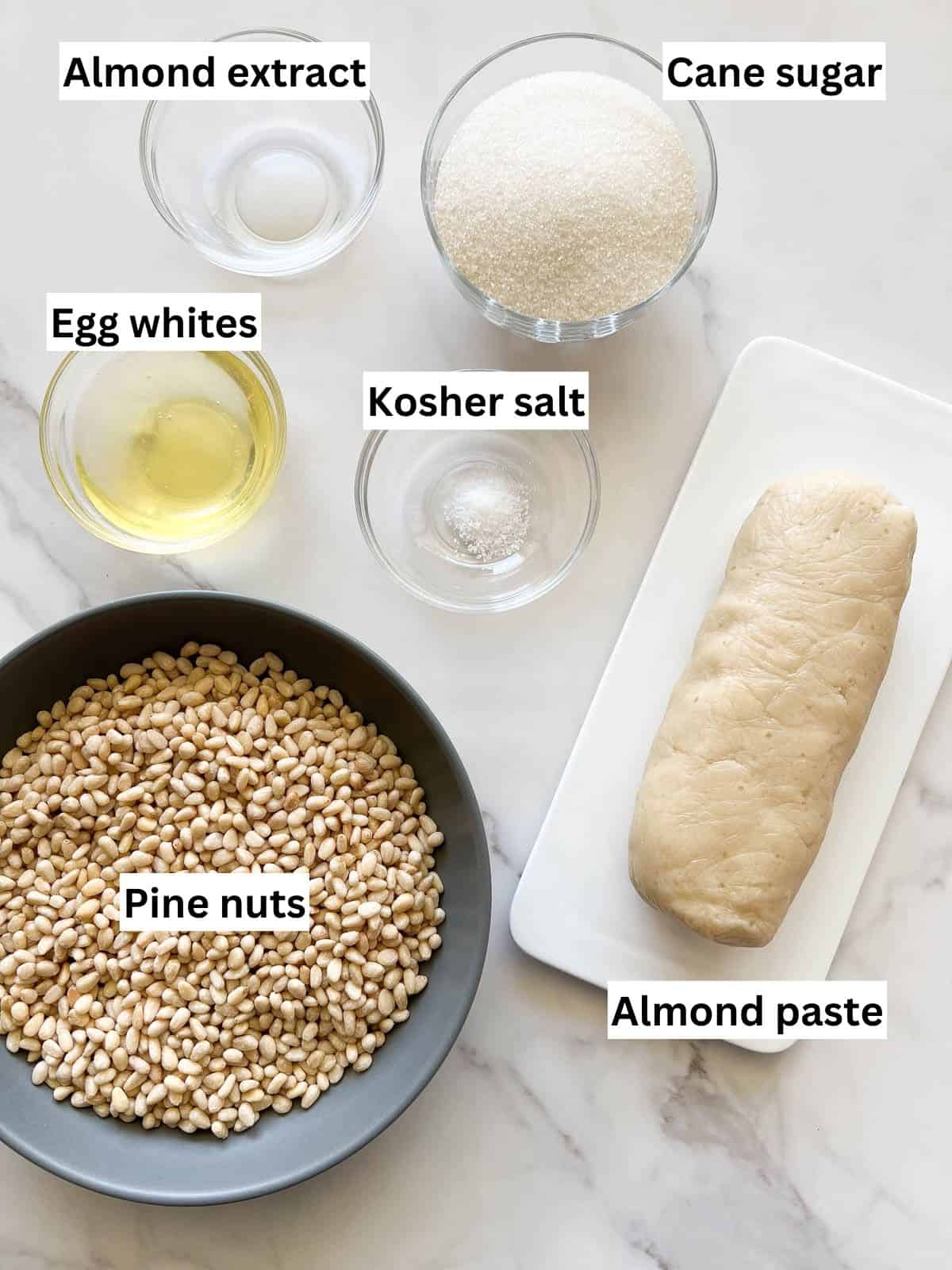 The ingredients to make pignoli cookies.