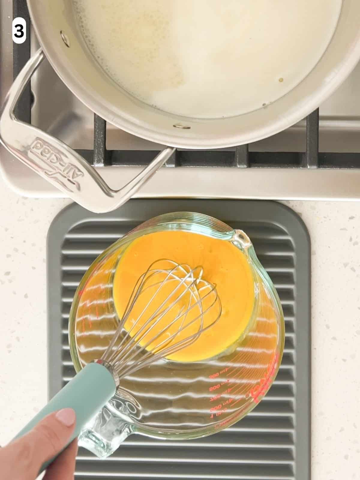 The egg yolks are whisked together until combined.