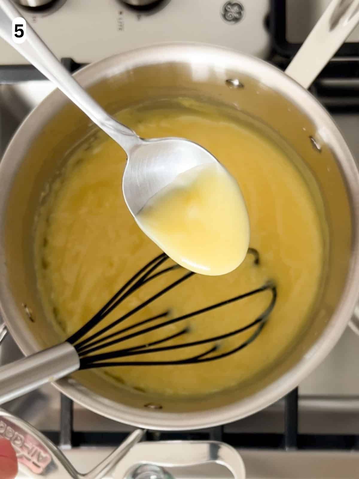 The cornstarch slurry is added and cooked until it reaches a thick pudding.