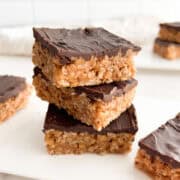 A stack of chocolate peanut butter rice crispy treats.