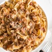 A bowl of tagliatelle bolognese.
