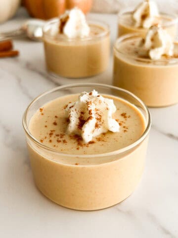 Pumpkin panna cotta in serving glasses.