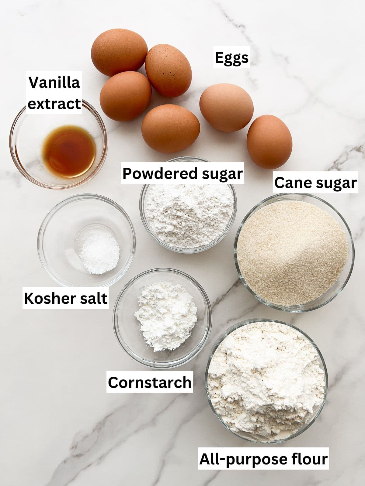 The ingredients to make savoiardi (ladyfingers).