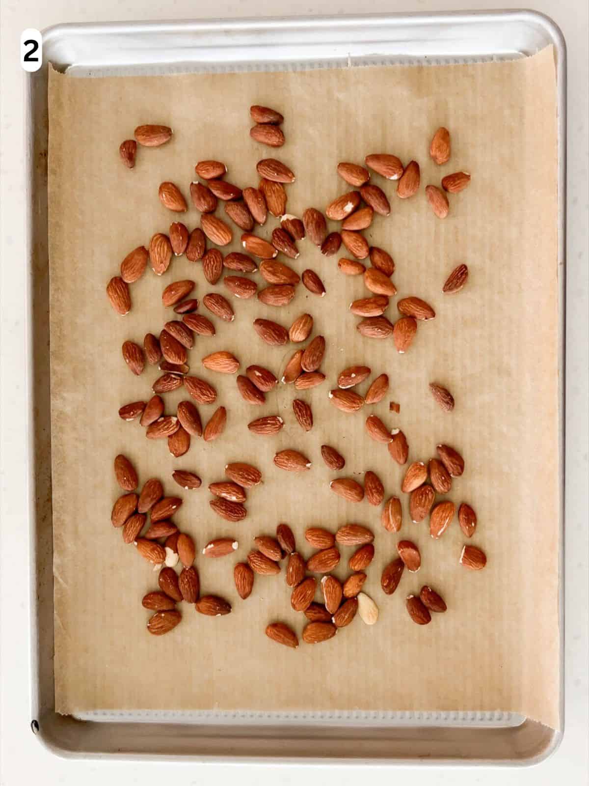 Toasted almonds on a baking sheet.