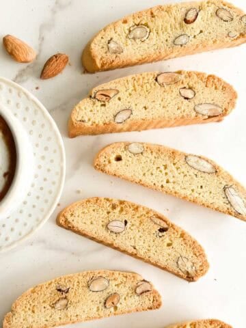 Almond biscotti (cantucci) with a latte to the side.