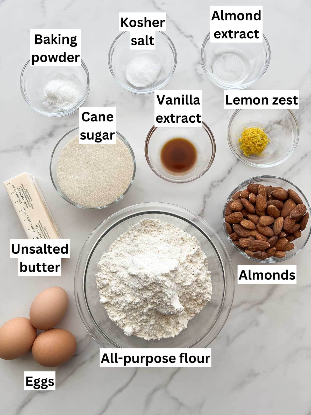 The ingredients to make almond biscotti (cantucci).