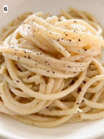 Cacio e pepe served on a plate.