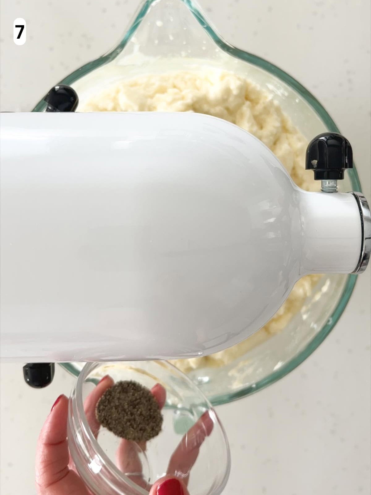 The potatoes are seasoned with salt and pepper before serving.