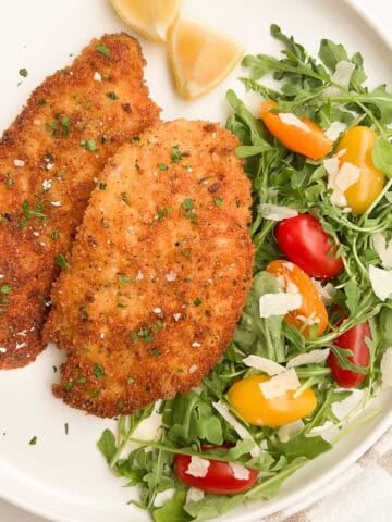 Chicken Milanese with an arugula salad to the side.