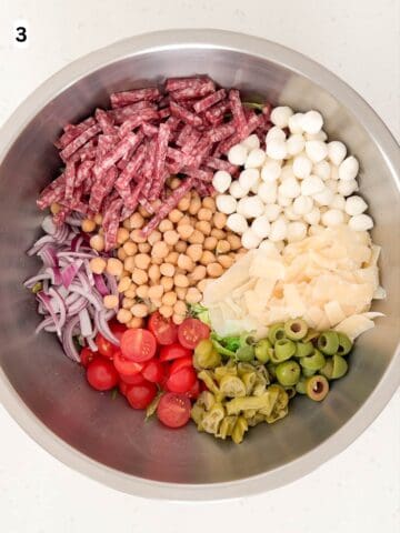 The remaining ingredients are added on top of the lettuce.