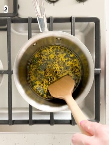 Lemon zest, lemon juice, basil, salt, and pepper stirred into the infused olive oil.