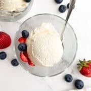 A scoop of no egg vanilla ice cream in a bowl.
