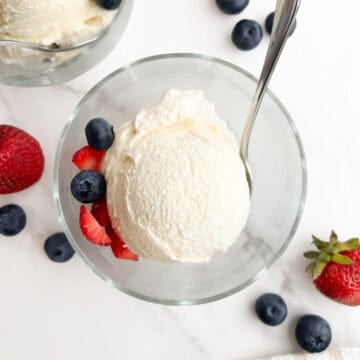 A scoop of no egg vanilla ice cream in a bowl.