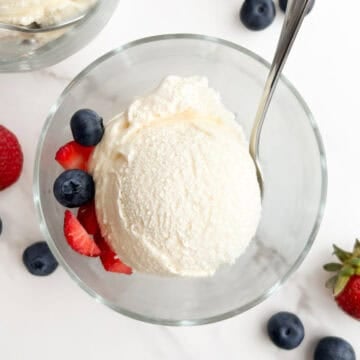 A scoop of no egg vanilla ice cream in a bowl.