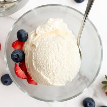 A scoop of no egg ice cream in a bowl.
