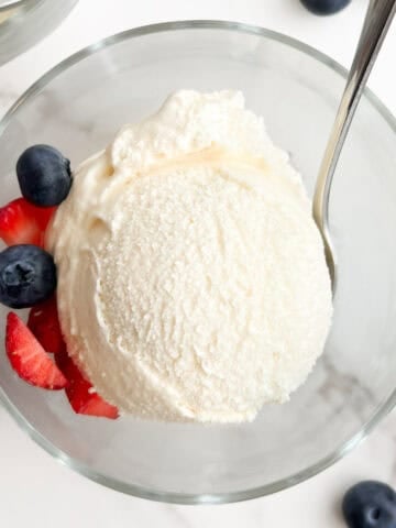 A scoop of no egg ice cream in a bowl.