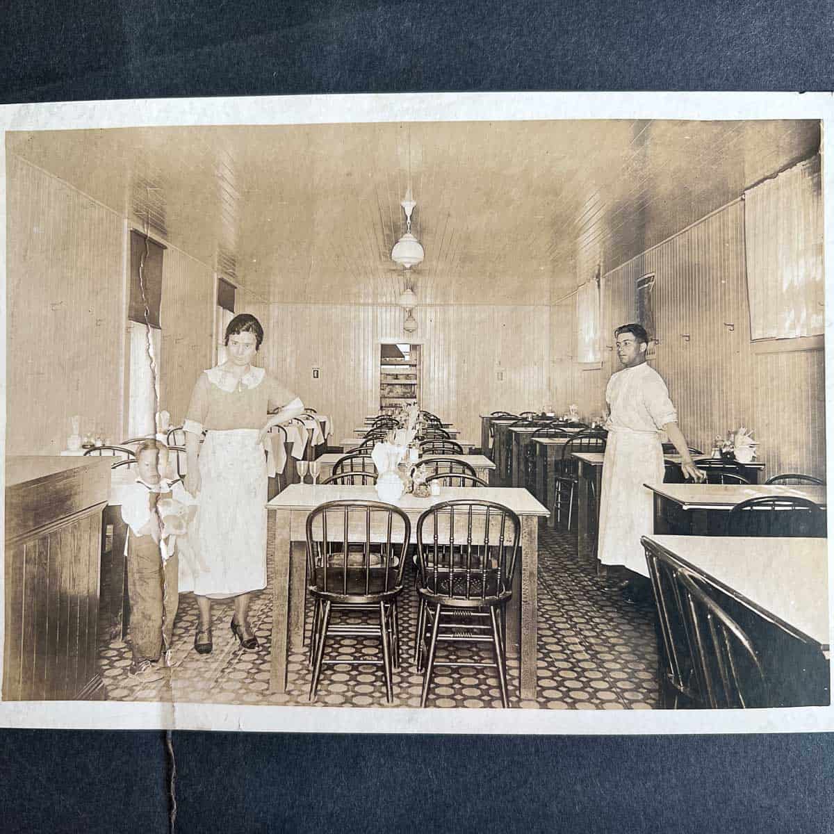 My grandfather as a boy with my great-grandmother in their Italian restaurant in San Francisco.